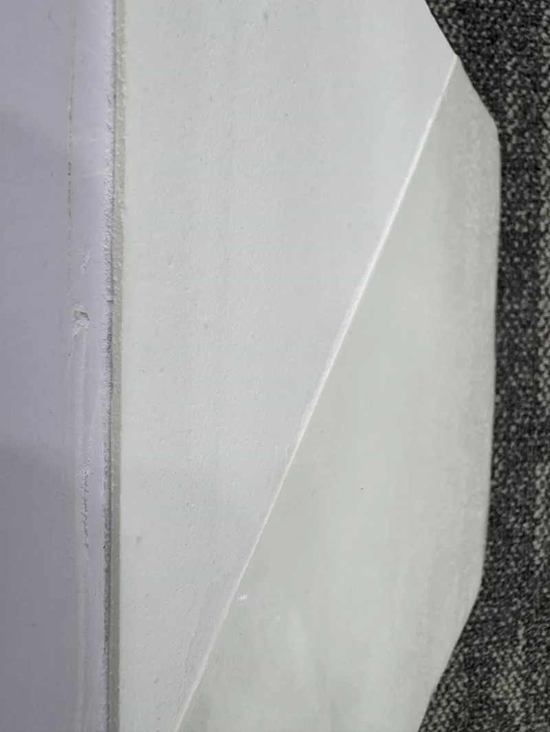 Aerogel sample — green-tape mounted disc