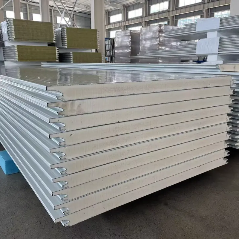 PU sandwich panel cross-section showing cream-colored rigid foam core between steel skins